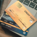 Credit card vs debit card side by side on a desk