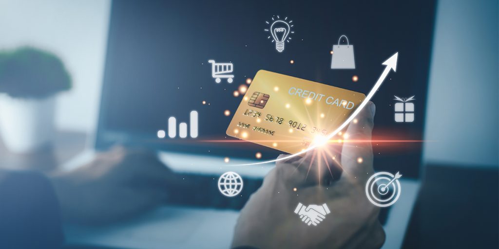Credit card vs debit card side by side on a desk